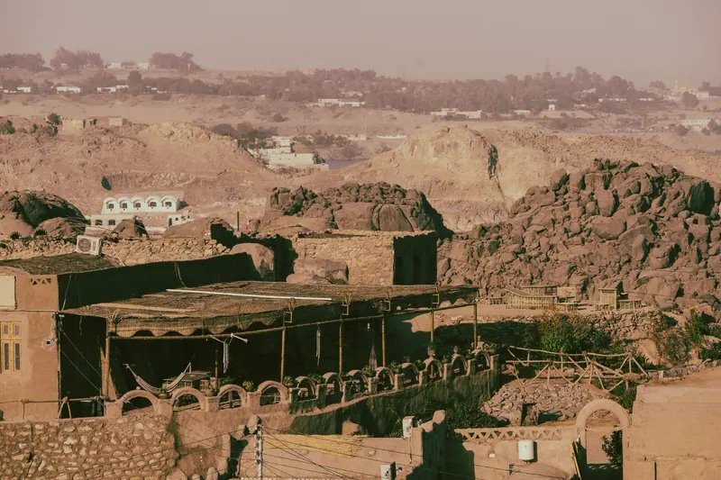 Earthen buildings and shaded terraces nestled among the island’s rocks